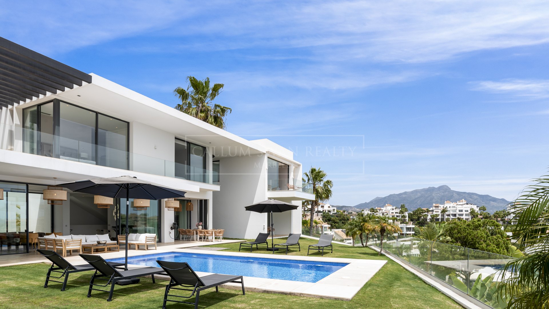 Five-Bedroom Contemporary Villa with Sea and Mountain Views in La Alquería, Benahavís
