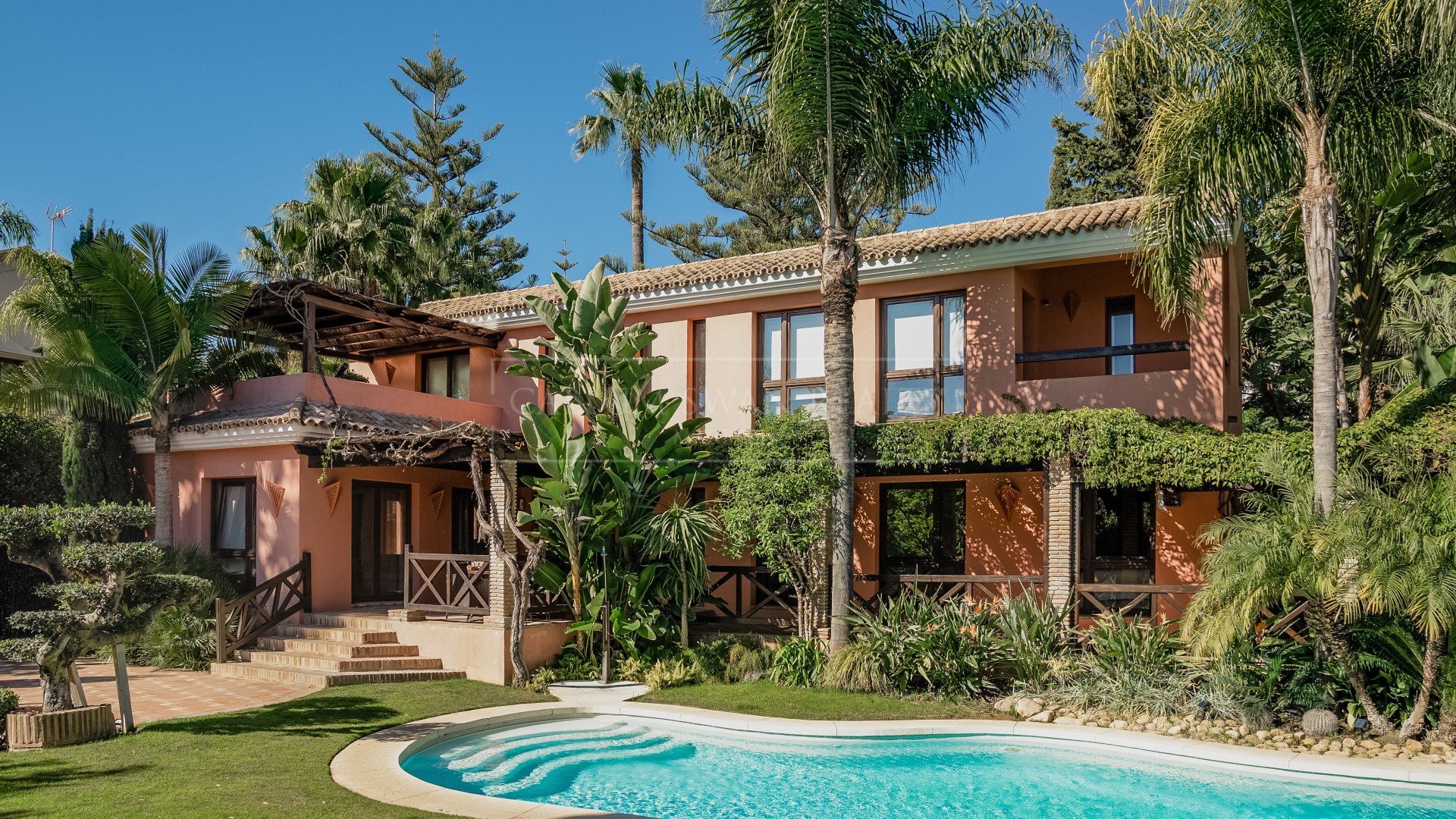 Luxurious Balinese-Style Villa on Marbella's Golden Mile, a short walk from the beach