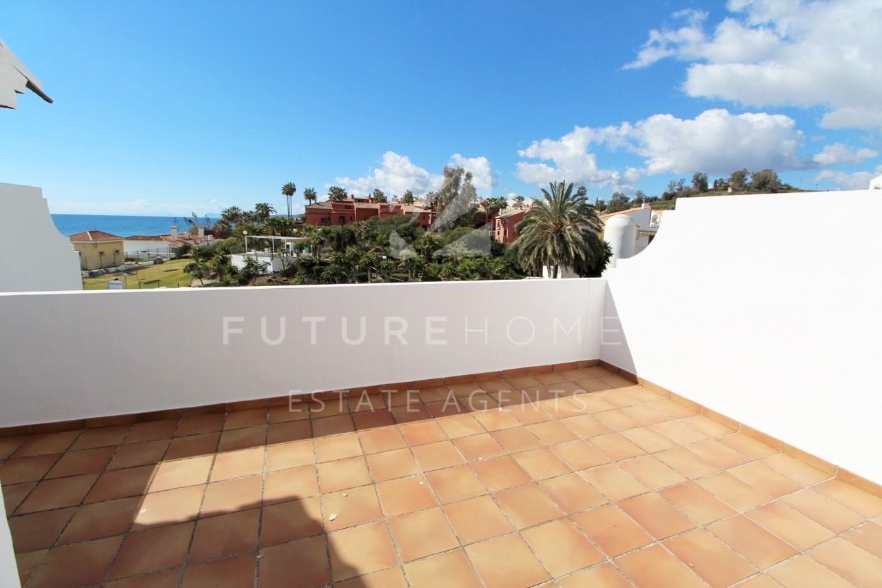 Spacious frontline beach townhouses within walking distance of Estepona port, key ready 