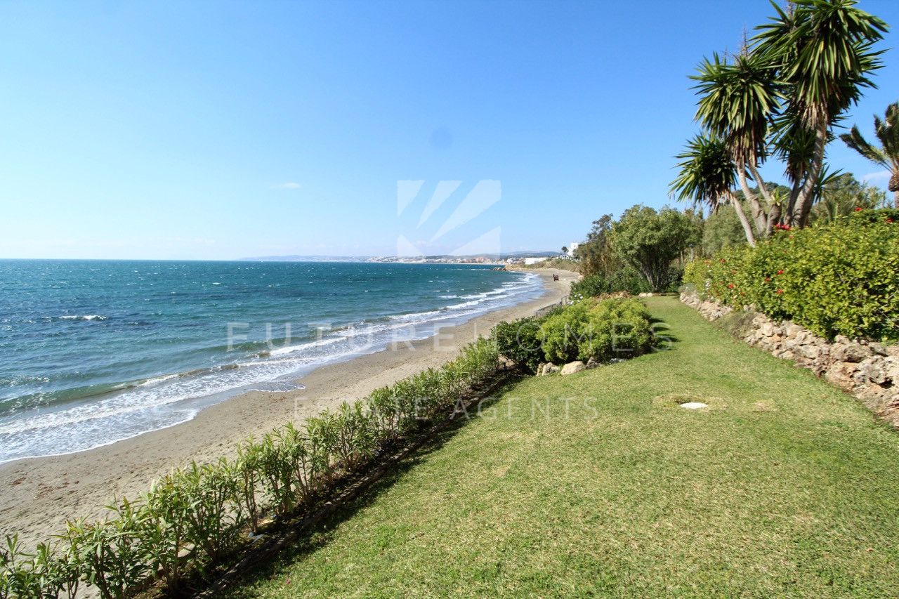 Frontline beach apartment with sea views located in La Playa del Cristo, Estepona 