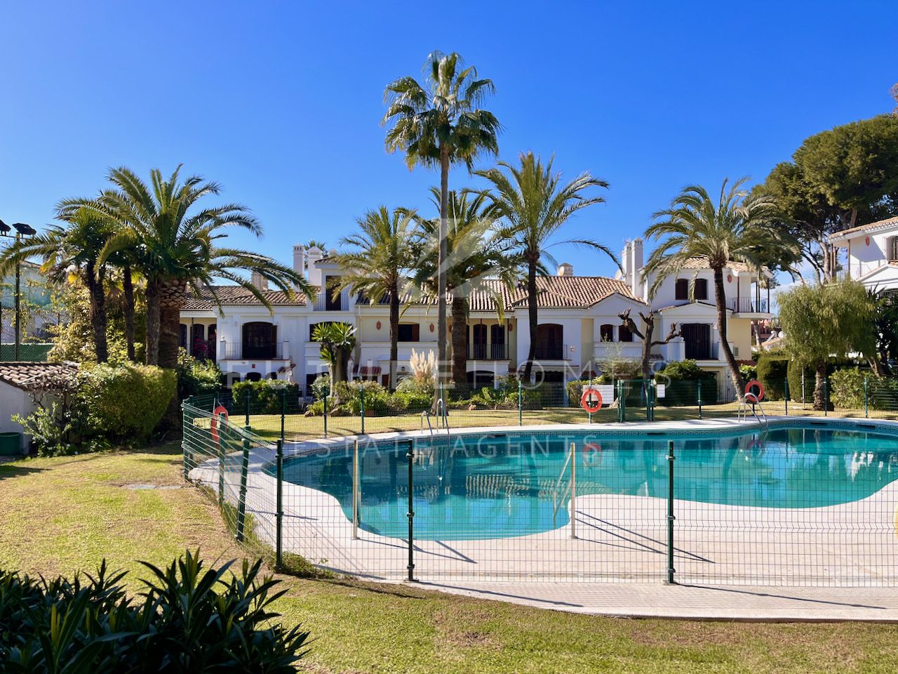 Location, location, location! Immaculate townhouse for sale metres from the beach and the coastal path in Estepona!
