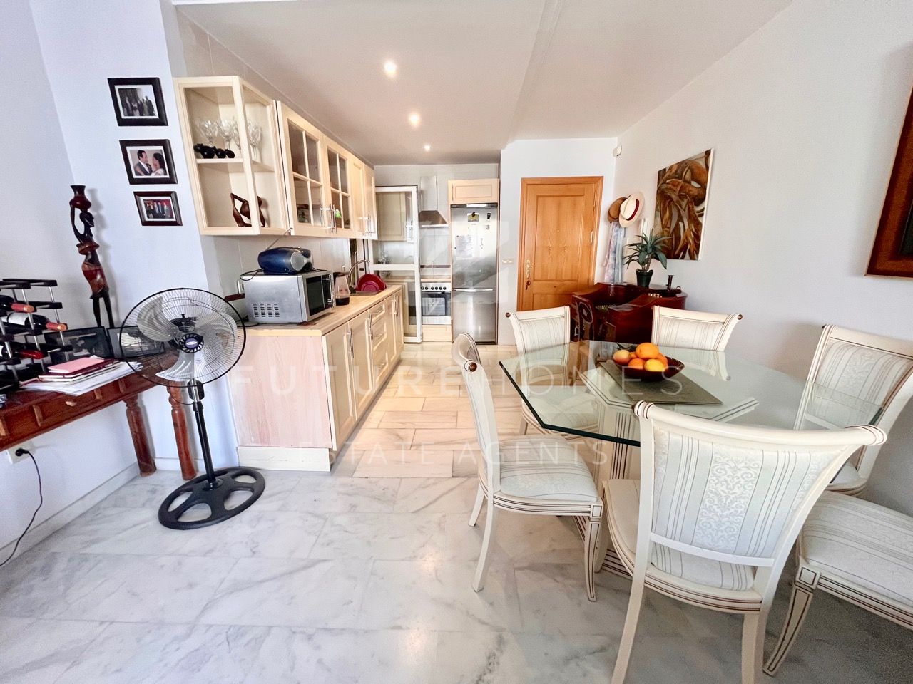 Modern top floor apartment with private parking metres away from Estepona beach and town centre