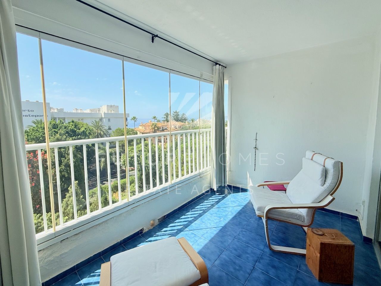 Exclusive listing! Sunny one bedroom apartment with sea views in the Estepona marina