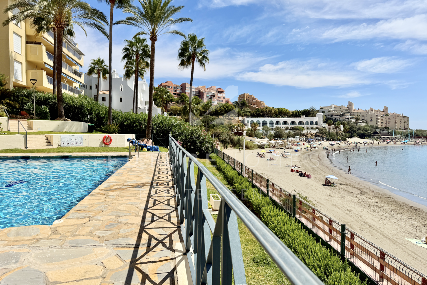 EXCLUSIVE - Frontline beach spacious top floor apartment overlooking Cristo beach, Estepona, with panoramic sea views