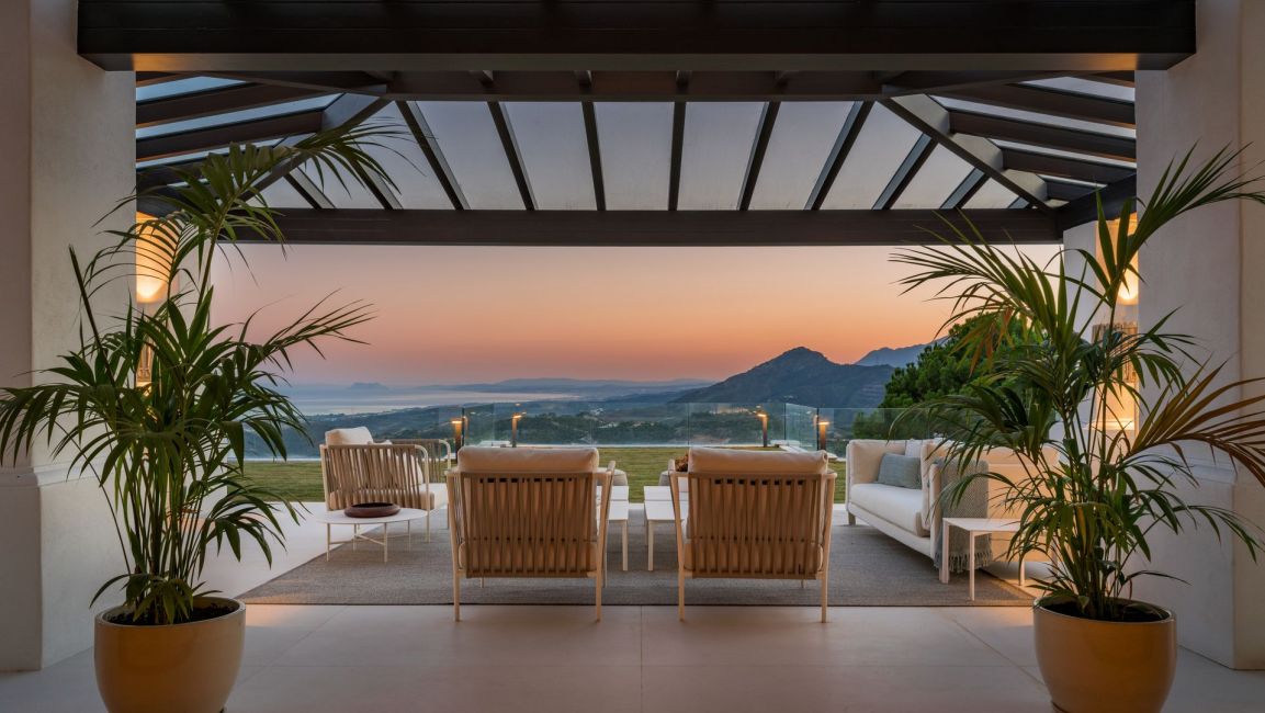 prime luxury real estate - panoramic terrace at sunset overlooking Gibraltar and the Mediterranean sea