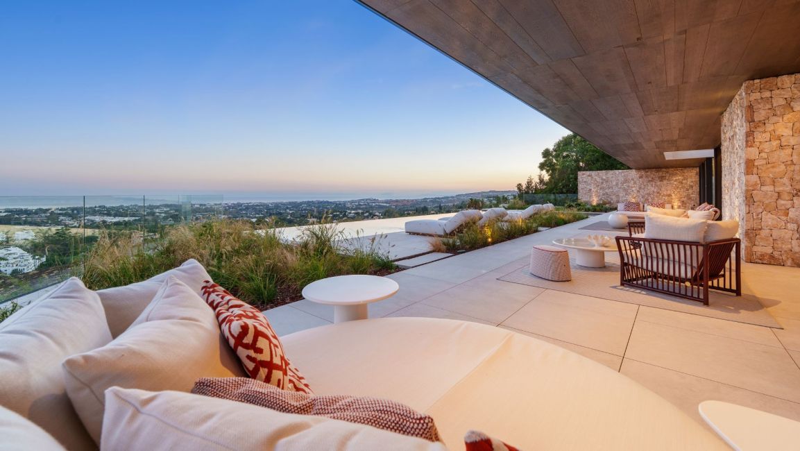 Terrace with panoramic Mediterranean sea views in villa in El Herrojo Alto, Benahavís
