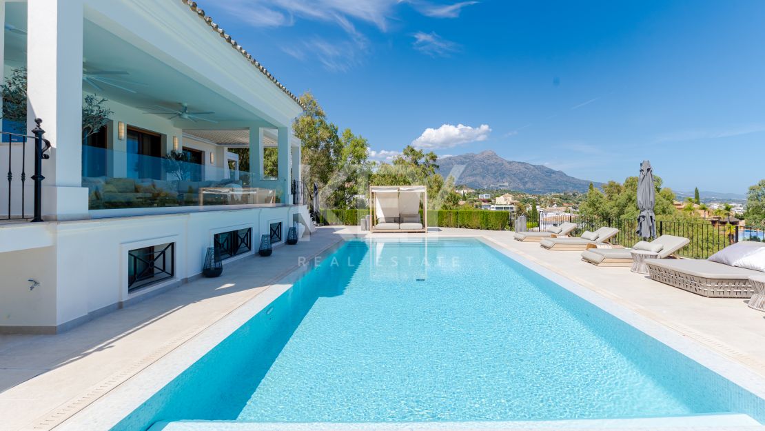 Роскошная вилла с видом на море Эль Эррохо, Бенаавис