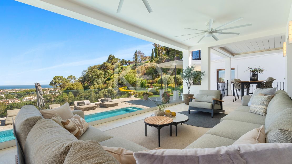 Роскошная вилла с видом на море Эль Эррохо, Бенаавис