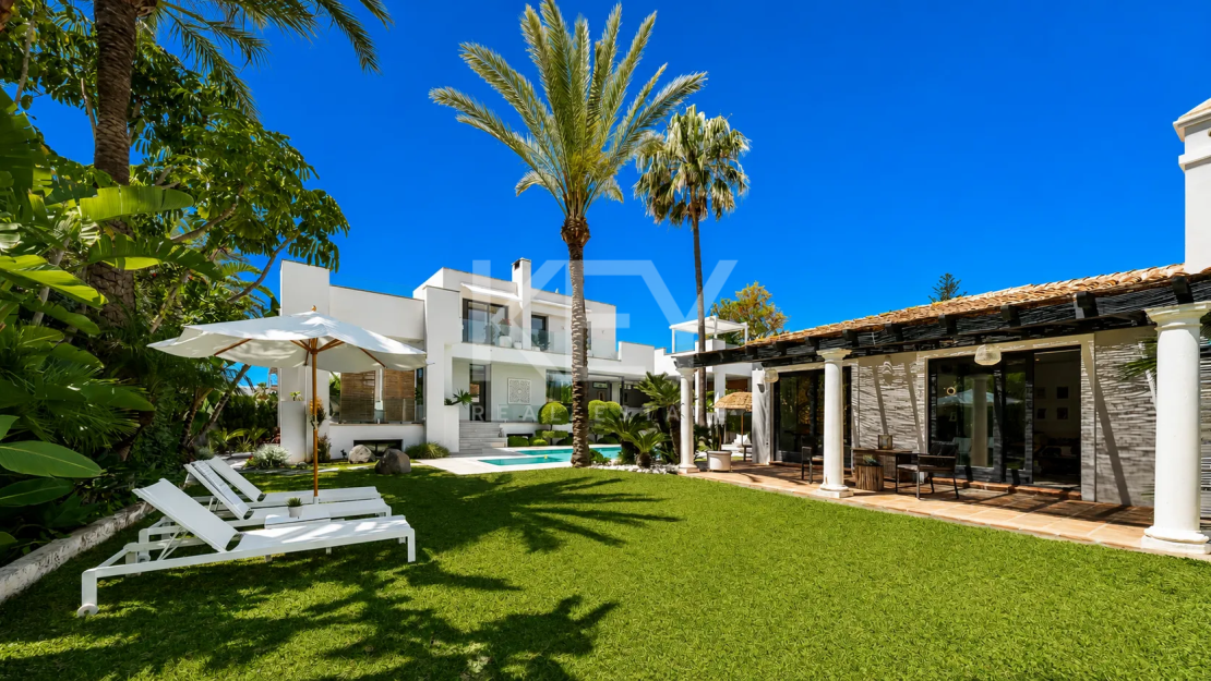 Beachside contemporary villa with guest house just steps from the sea in Marbella East