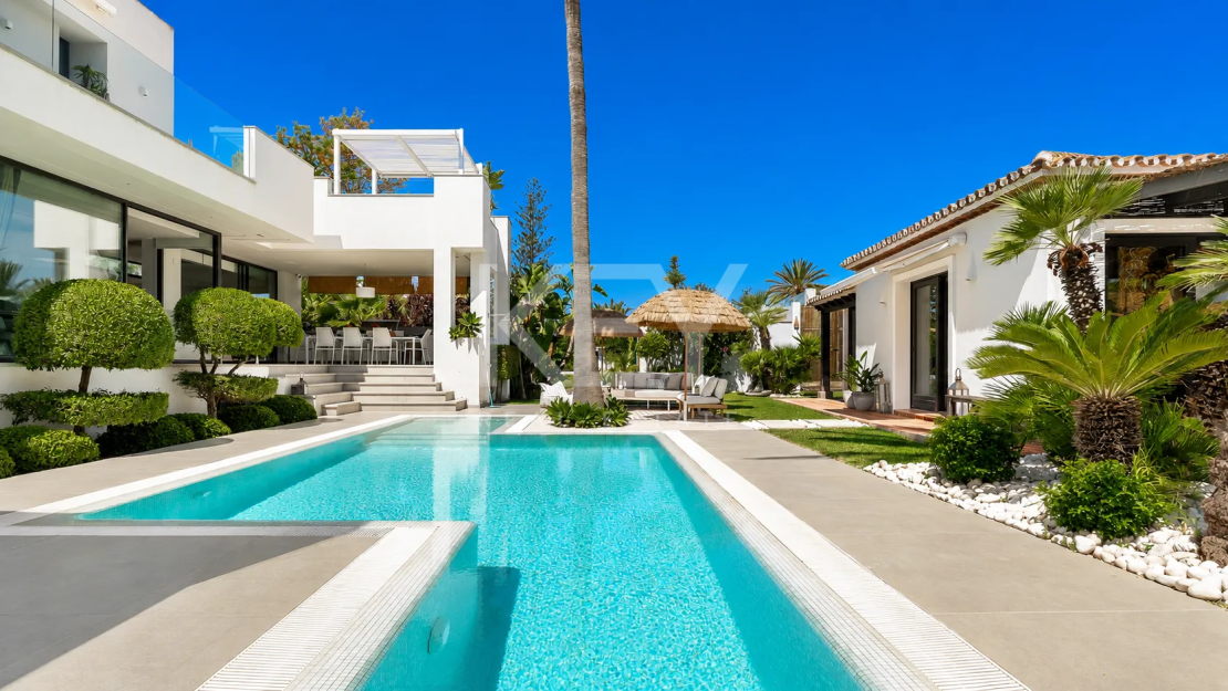 Beachside contemporary villa with guest house just steps from the sea in Marbella East