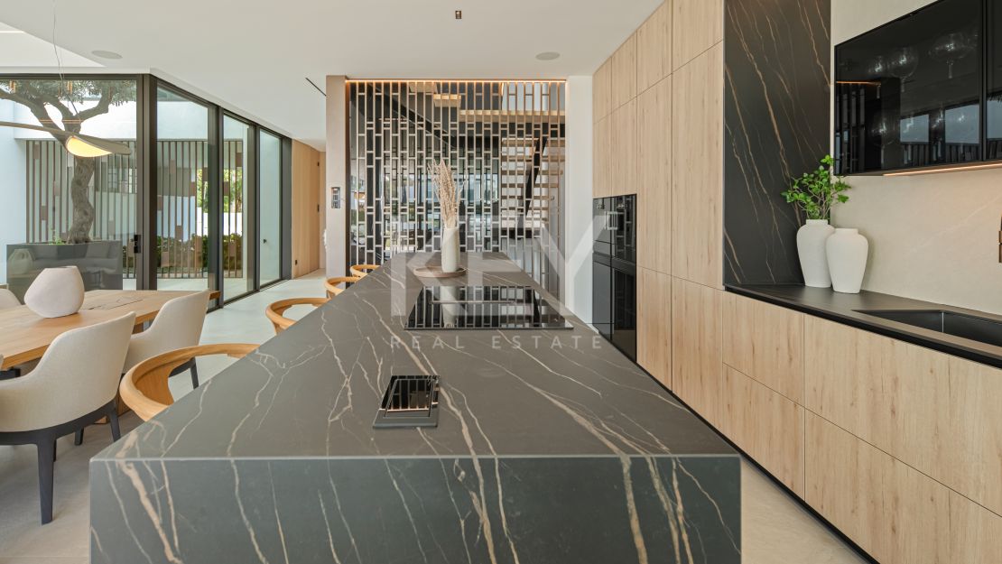 Modern semi-detached villa for sale on Marbella's Golden Mile