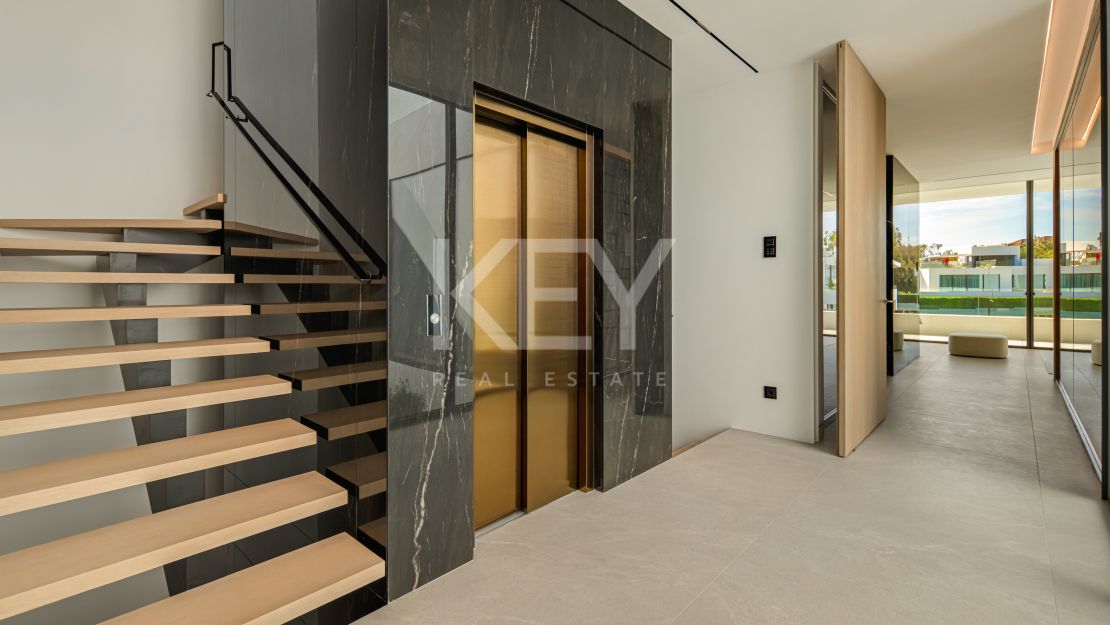 Modern semi-detached villa for sale on Marbella's Golden Mile