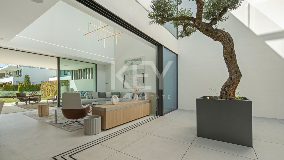 Modern semi-detached villa for sale on Marbella's Golden Mile