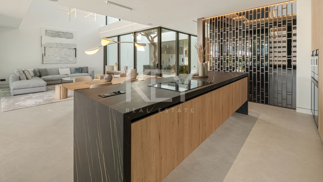 Modern semi-detached villa for sale on Marbella's Golden Mile