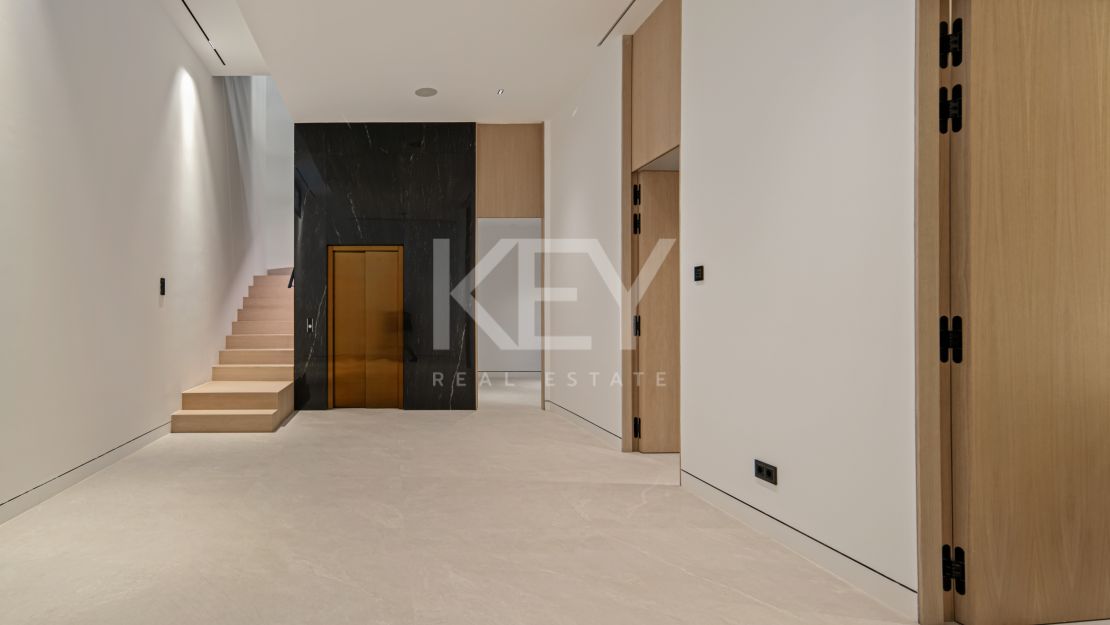 Modern semi-detached villa for sale on Marbella's Golden Mile