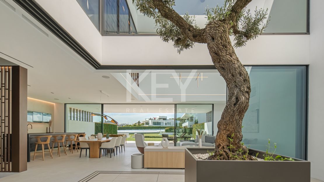 Modern semi-detached villa for sale on Marbella's Golden Mile