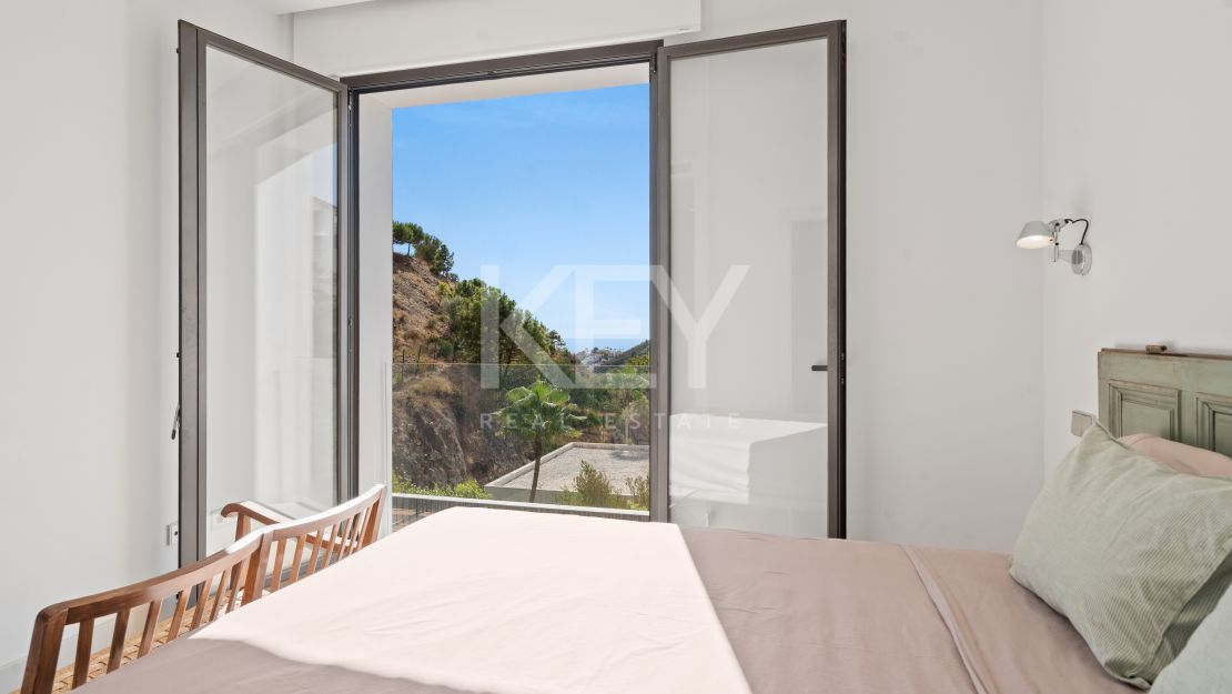 Modern Hillside Villa with Breathtaking Mountain and Sea Views in El Madroñal, Benahavis