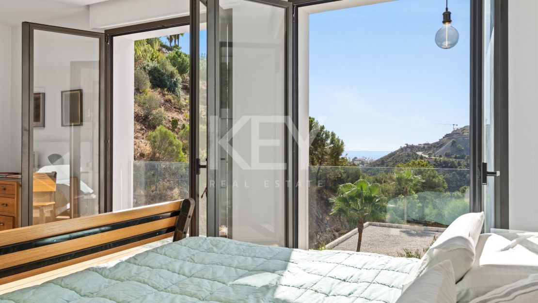 Modern Hillside Villa with Breathtaking Mountain and Sea Views in El Madroñal, Benahavis