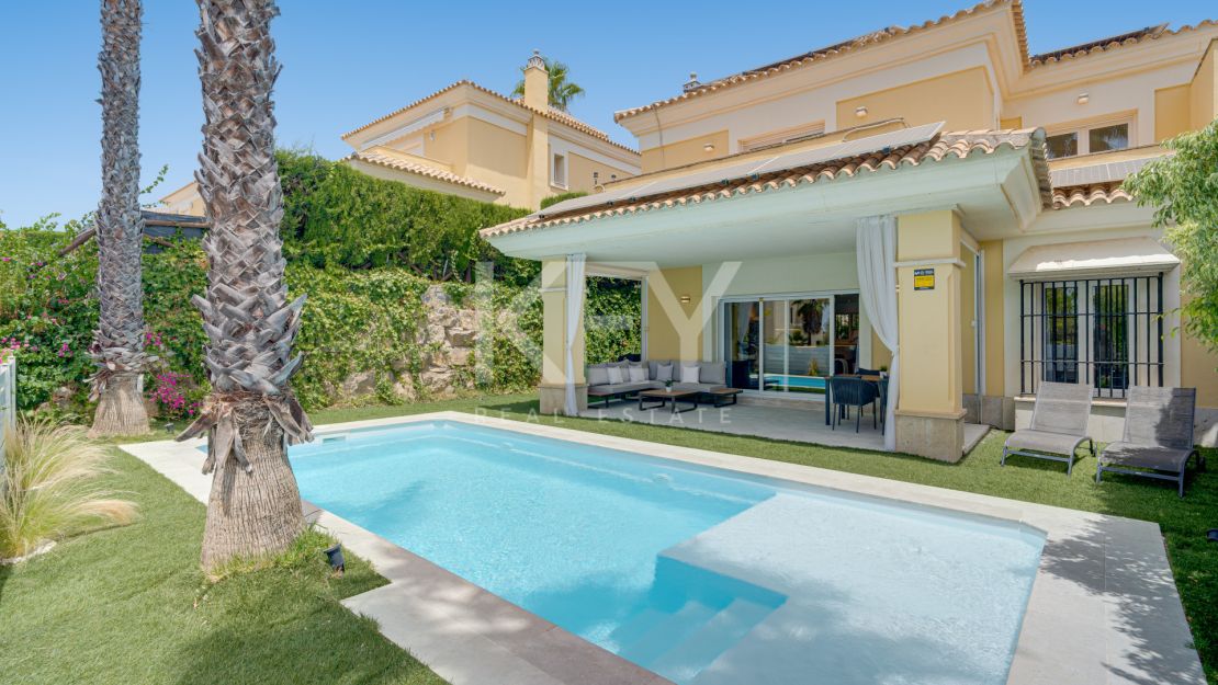 Beautiful south-facing Semi-detached Villa located within the exclusive gated community of Santa Clara Golf, Marbella