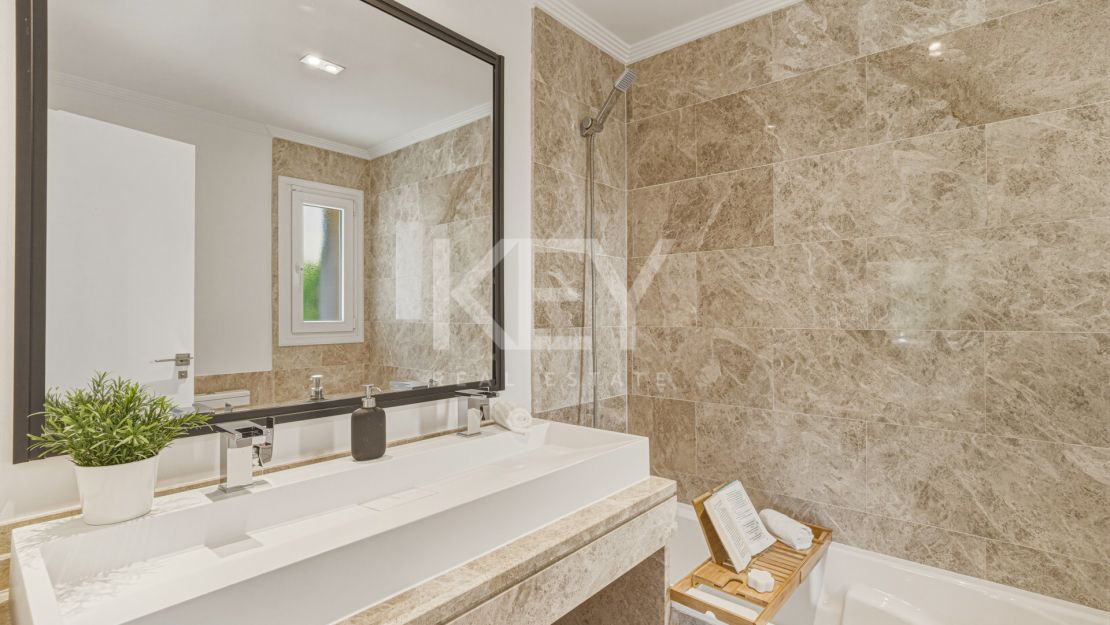 Beautiful south-facing Semi-detached Villa located within the exclusive gated community of Santa Clara Golf, Marbella