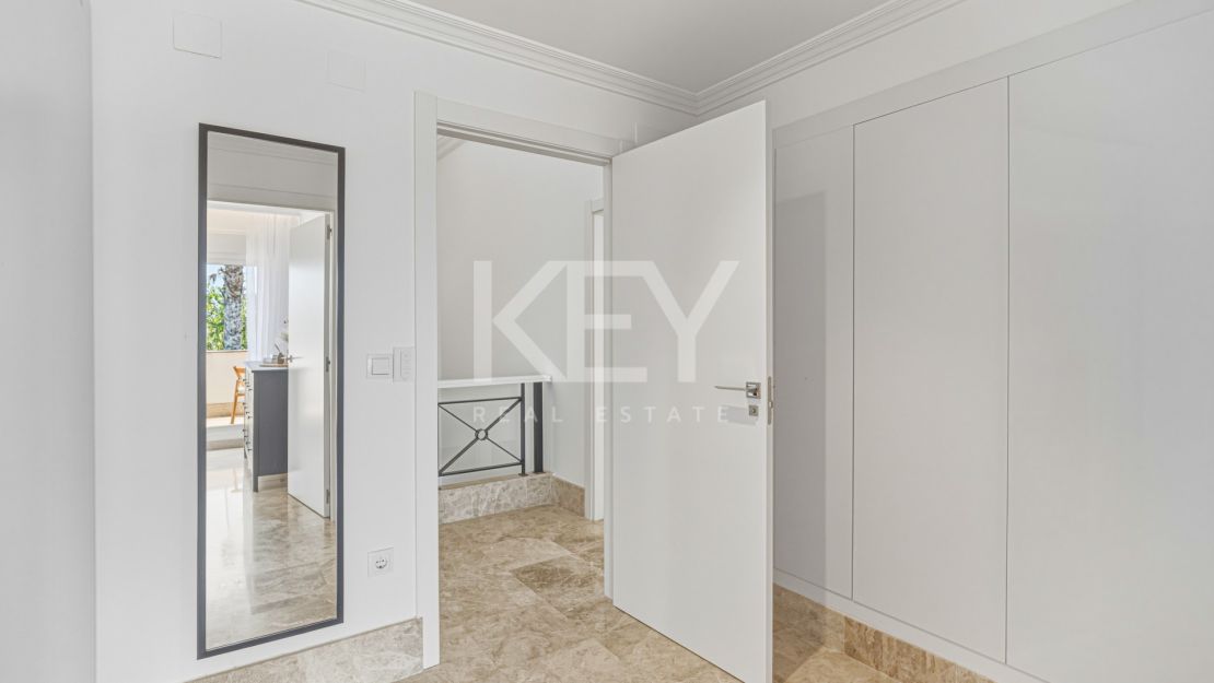 Beautiful south-facing Semi-detached Villa located within the exclusive gated community of Santa Clara Golf, Marbella