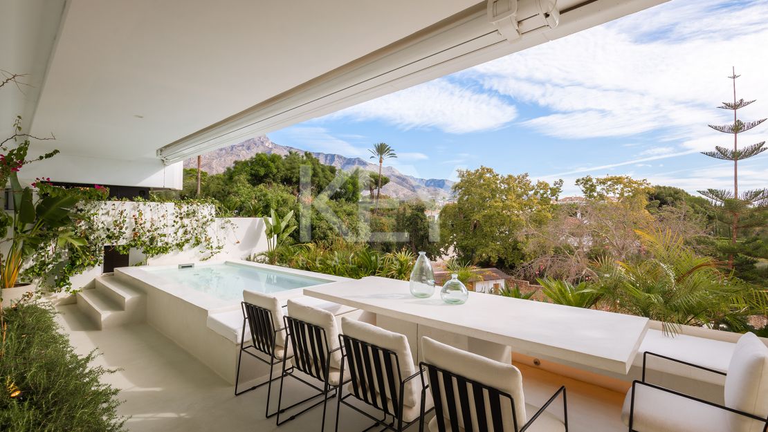 Renovated apartment with mountain views and private pool on the Golden Mile