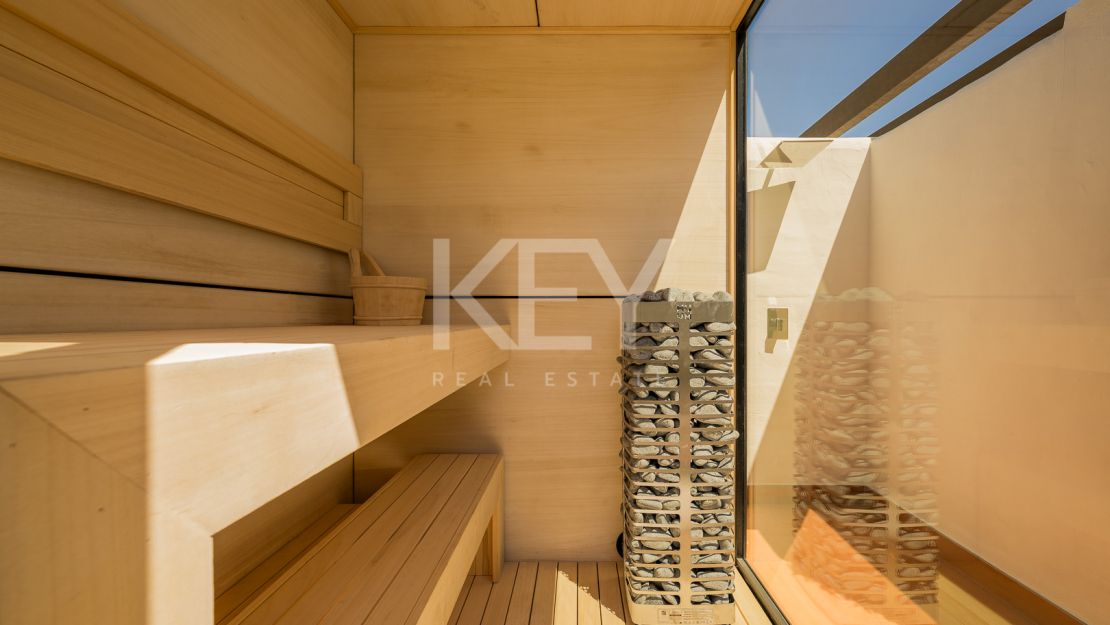 Beachfront penthouse with rooftop spa and panoramic sea views