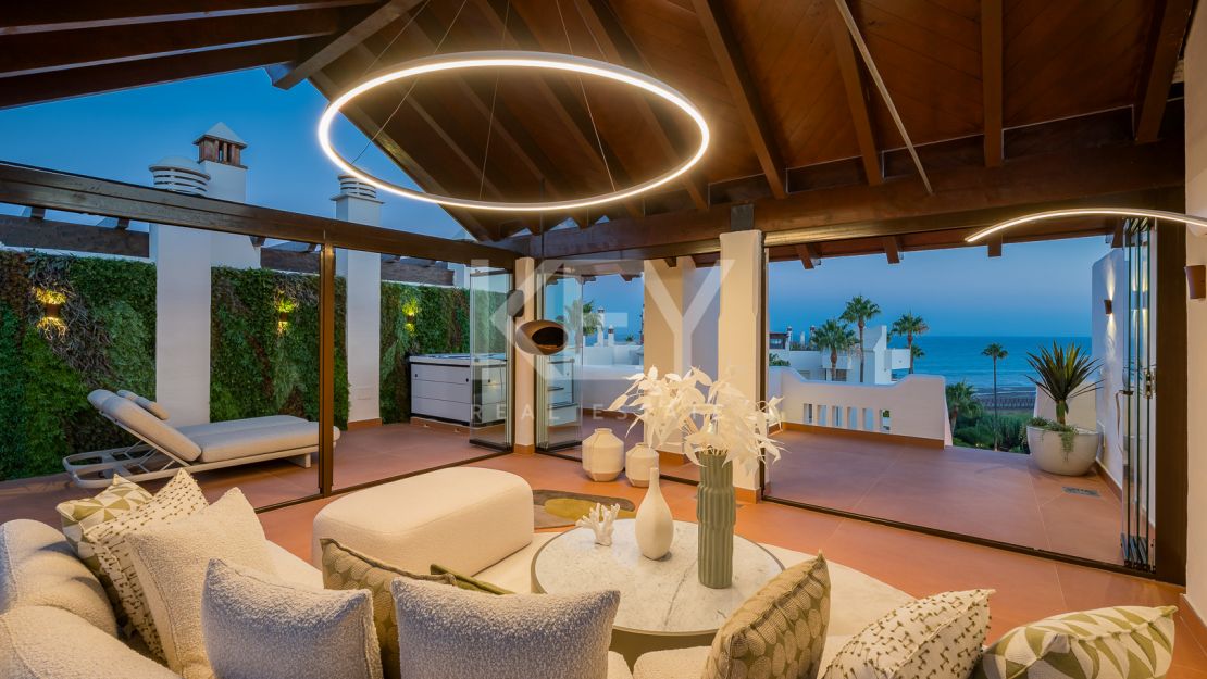 Beachfront penthouse with rooftop spa and panoramic sea views