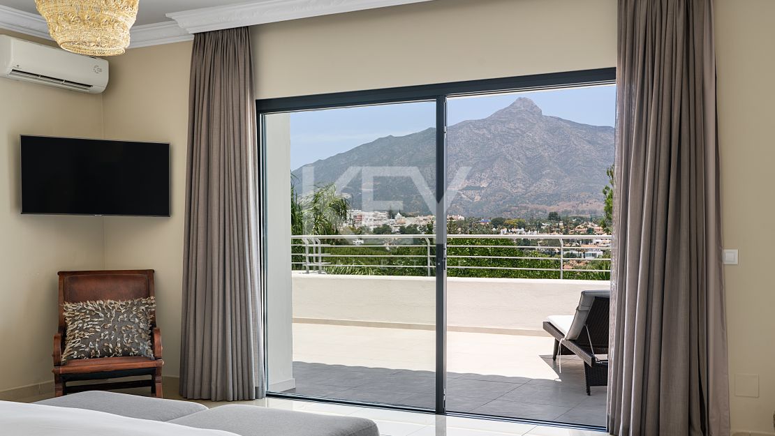 Andalusian-style villa with panoramic golf and mountain views in Las Brisas, Nueva Andalucía