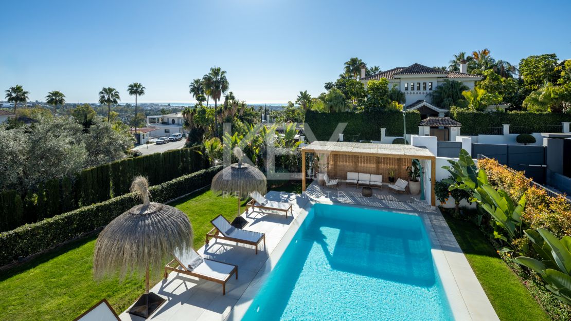 Moderna villa de 5 dormitorios con vistas al mar en venta en La Cerquilla, Nueva Andalucía