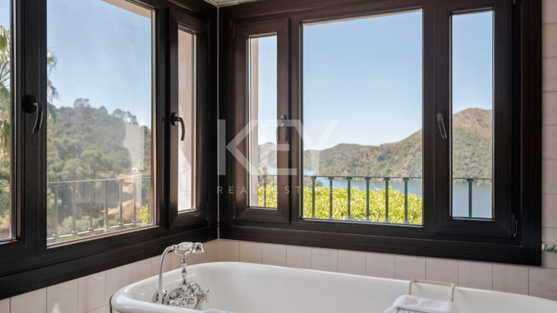 Andalusian finca with panoramic lake and mountain views near Marbella