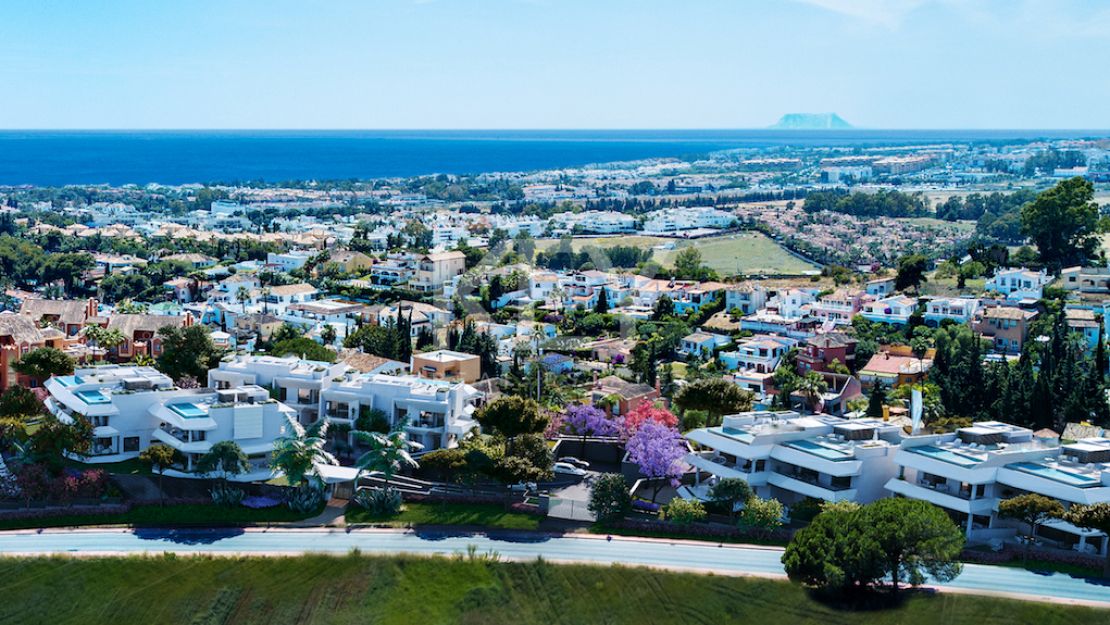 Moderna villa pareada con piscina en la azotea y vistas al mar en Nueva Andalucía