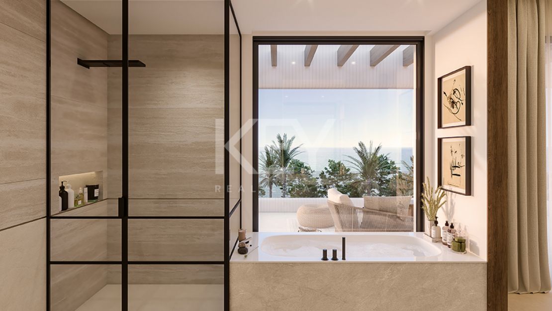 Lujosa villa pareada situada en primera línea de playa en Las Chapas, Marbella