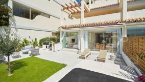 Buy Nueva Andalucia ground floor apartment with 3 bedrooms