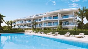 Key ready contemporary apartment in a gated community set within a 5* sports resort which also includes a newly open beach club!