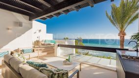 Meticulously renovated beachfront duplex penthouse in Puente Romano