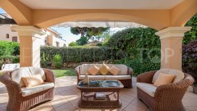 Corner private garden apartment in the well-known and luxury complex in Elviria