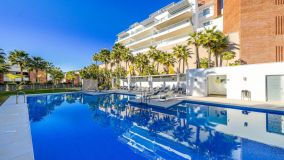 Luxury, modern elevated ground floor apartment of 2 bedrooms and 2 bathrooms with luxury specifications in the famous Resort Los Arqueros Golf with 24h security.