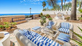 P.O.A. Nestled in the heart of the Golden Mile, this exquisite Moorish-style 5 bedroom villa is one of only a few houses that can truly claim to be frontline beach. With direct access straight onto the sand, there is nothing separating you from the shorel