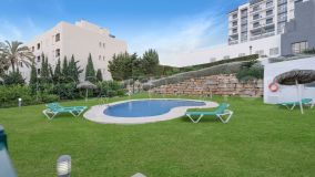 Gorgeous 2-bedroom ground floor apartment with large terrace and private garden in golf front residential in La Duquesa.