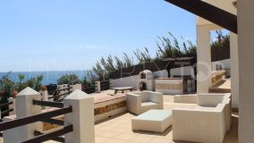 Unique beachfront villa, next to Torre Vigía in Punta Chullera, on top of the rocks, with direct access to the beach.