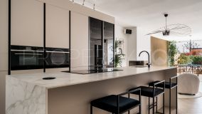 Buy Nueva Andalucia ground floor apartment