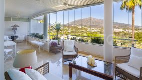 Dazzling duplex penthouse with panoramic views in Nueva Andalucia, Marbella.