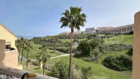 Beautiful 2 bed front-line golf apartment with partial sea views for sale in Duquesa Village, Manilva