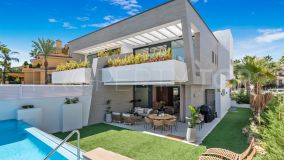 Semi-detached villa offering luxurious beachside living for sale in Banus Bay Residences, Marbella