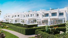 New townhouse with beautiful interiors and large solarium for sale in Bahía de las Rocas, Manilva