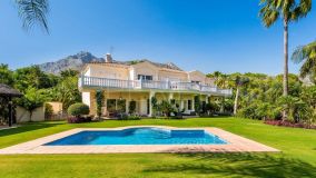 Exquisite 6-Bedroom Residence in Marbella's Premier Gated Community with Luxurious Amenities and Spacious Grounds