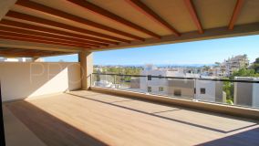 Fantastic brand new raised ground floor apartment with sea views for sale in Marbella Lake, Nueva Andalucia, Marbella