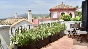 A charming triplex apartment in the picturesque La Heredia with amazing coastal views