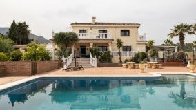 Fantastic seven bedroomed countryside villa on a large plot with tennis court, gym, sauna, large outdoor pool and panoramic mountain and sea views.